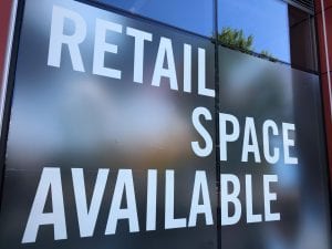 Commercial retail space available sign.